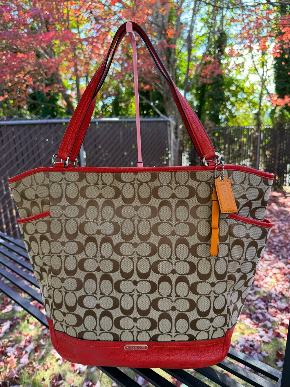 Coach Brown Signature Canvas Tote with Orange red Trim and Orange Tag